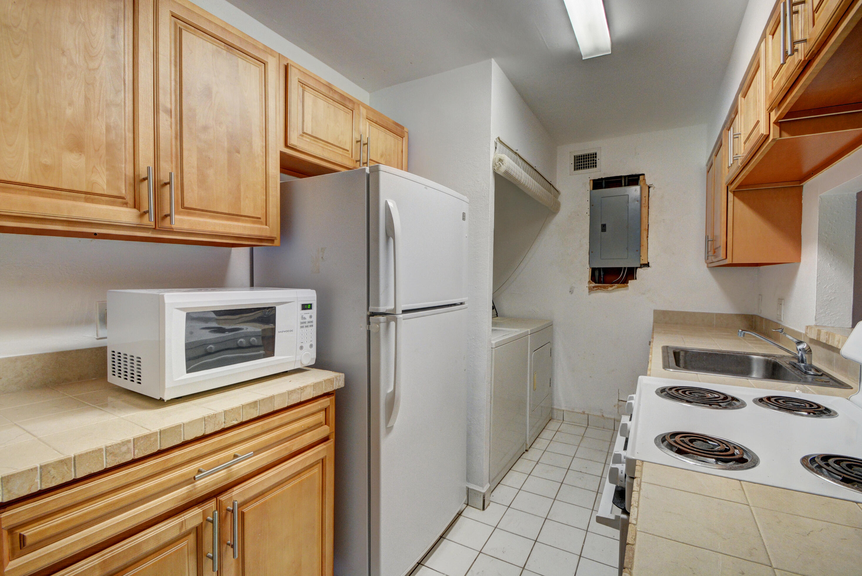 4531 Treehouse Lane, Unit E Tamarac, FL 33319 - Photo 11 of 18 Kitchen