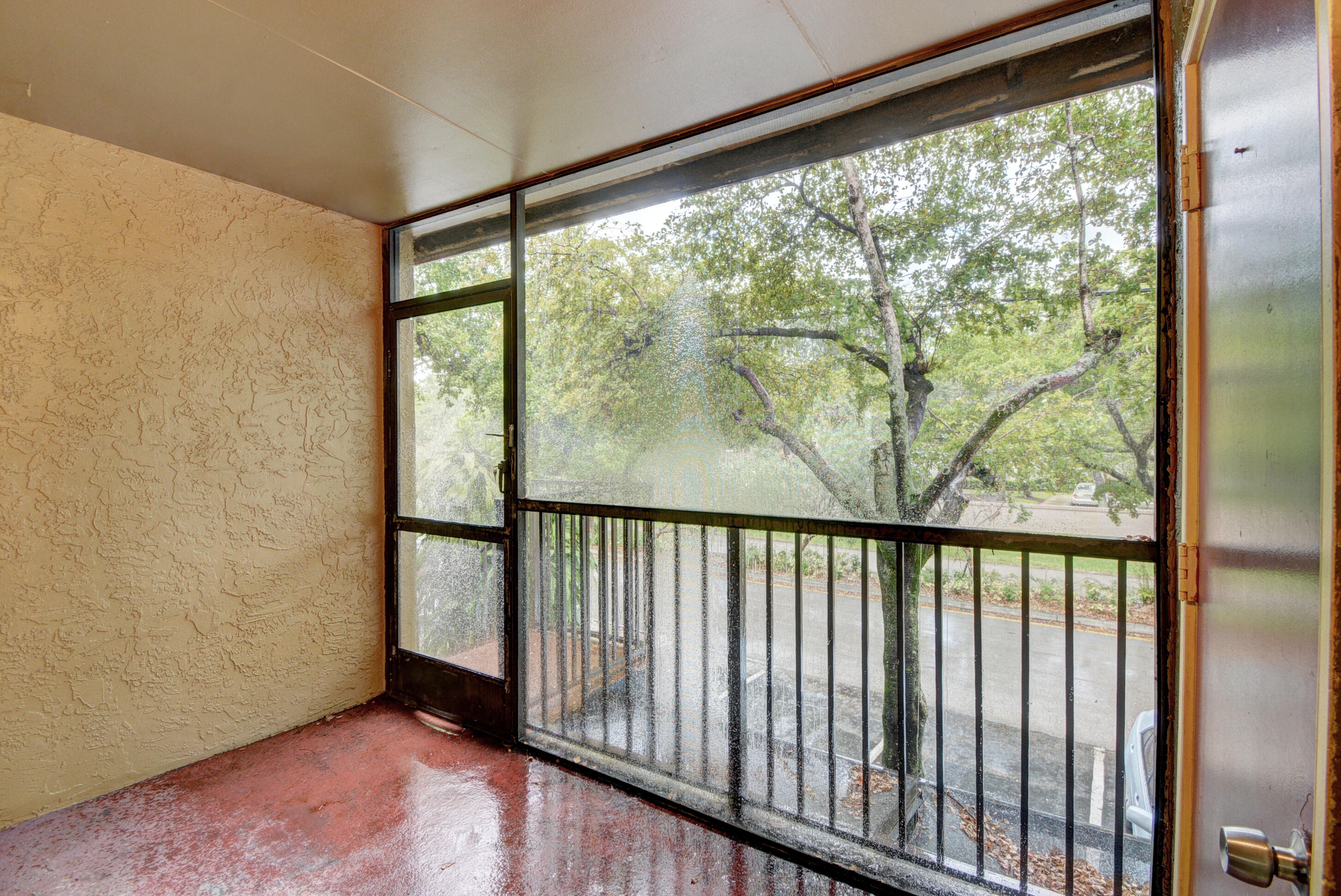 4531 Treehouse Lane, Unit E Tamarac, FL 33319 - Photo 14 of 18 Screened Balcony