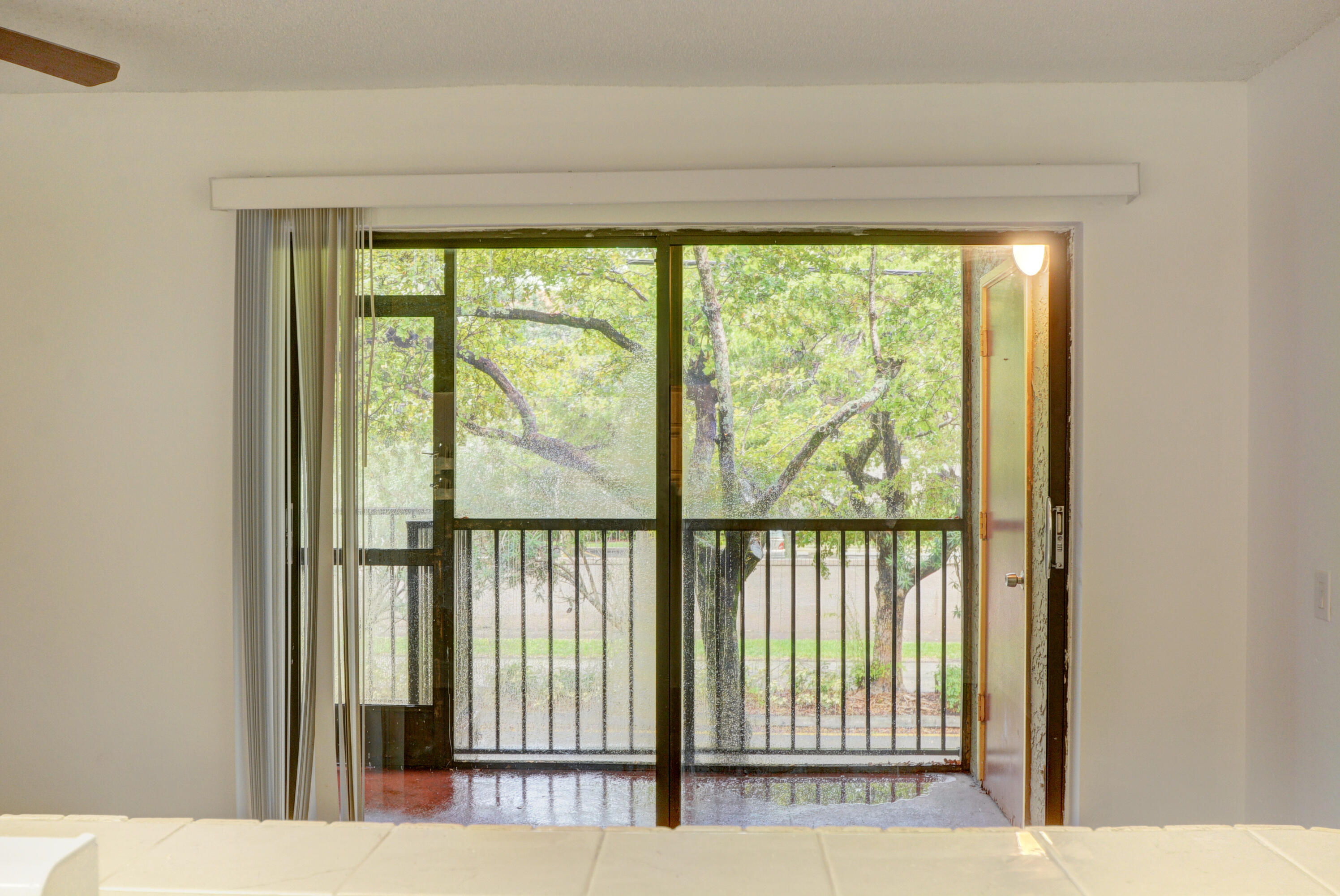 4531 Treehouse Lane, Unit E Tamarac, FL 33319 - Photo 15 of 18 Screened Balcony