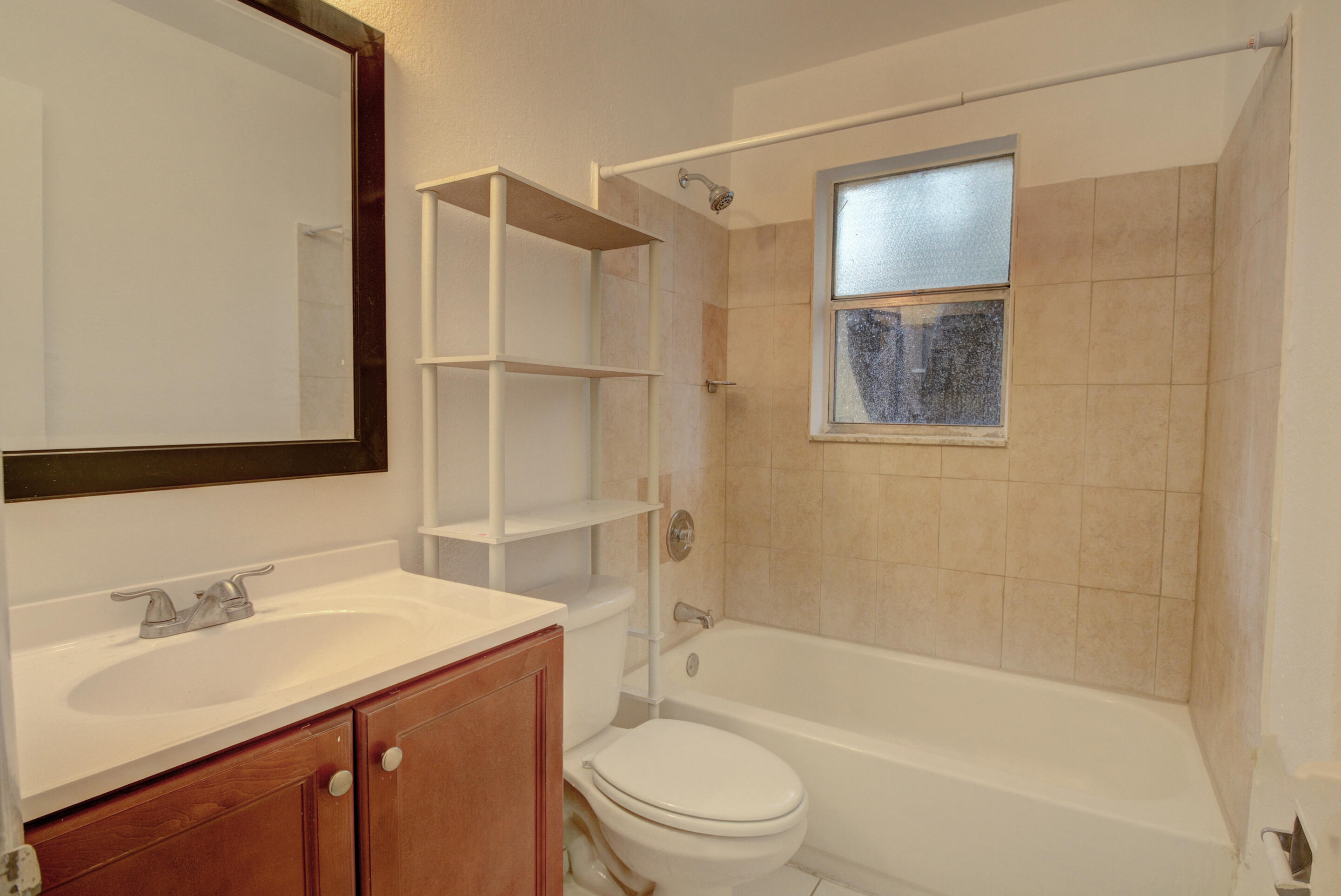 4531 Treehouse Lane, Unit E Tamarac, FL 33319 - Photo 17 of 18 Guest Bathroom