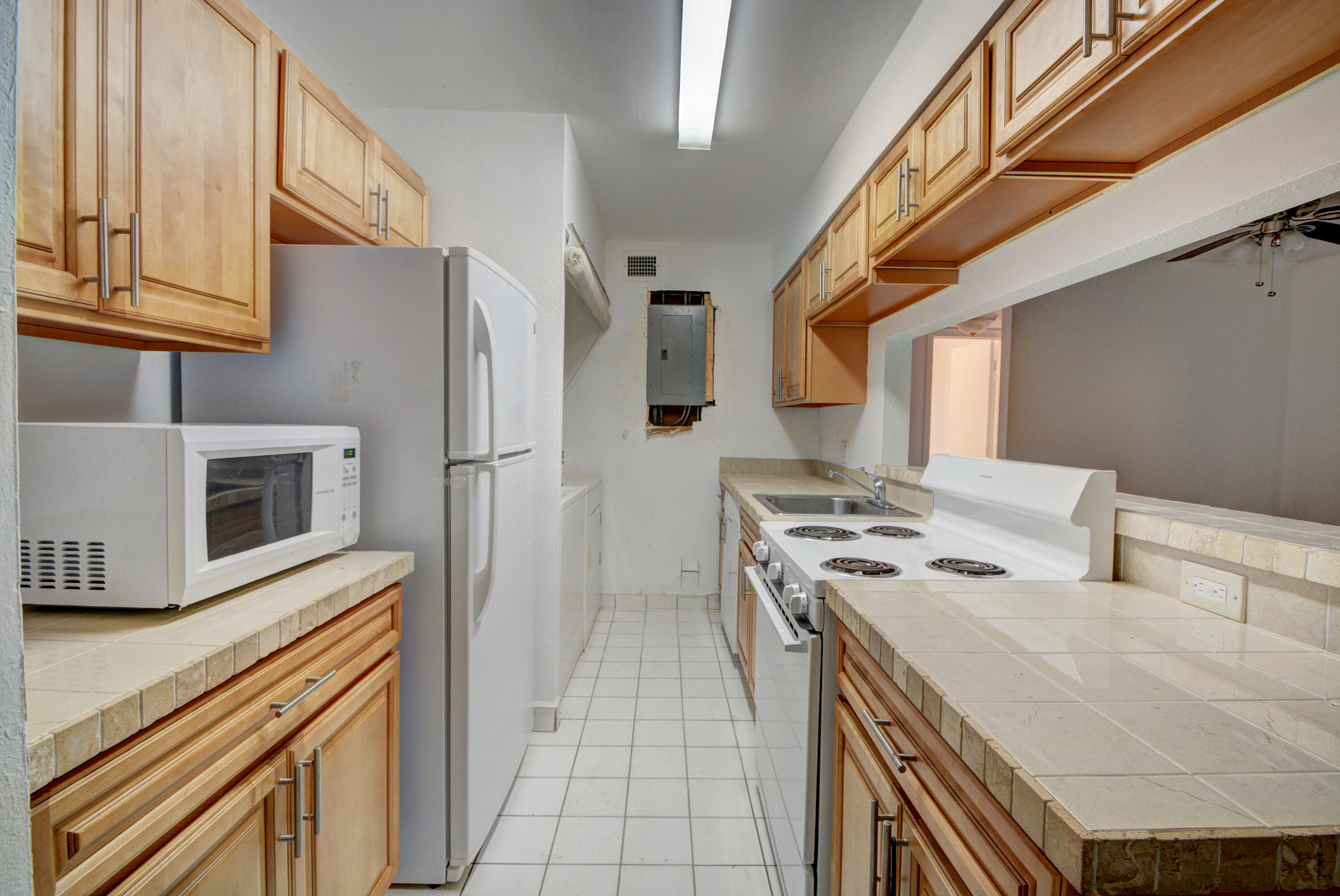 4531 Treehouse Lane, Unit E Tamarac, FL 33319 - Photo 9 of 18 Kitchen