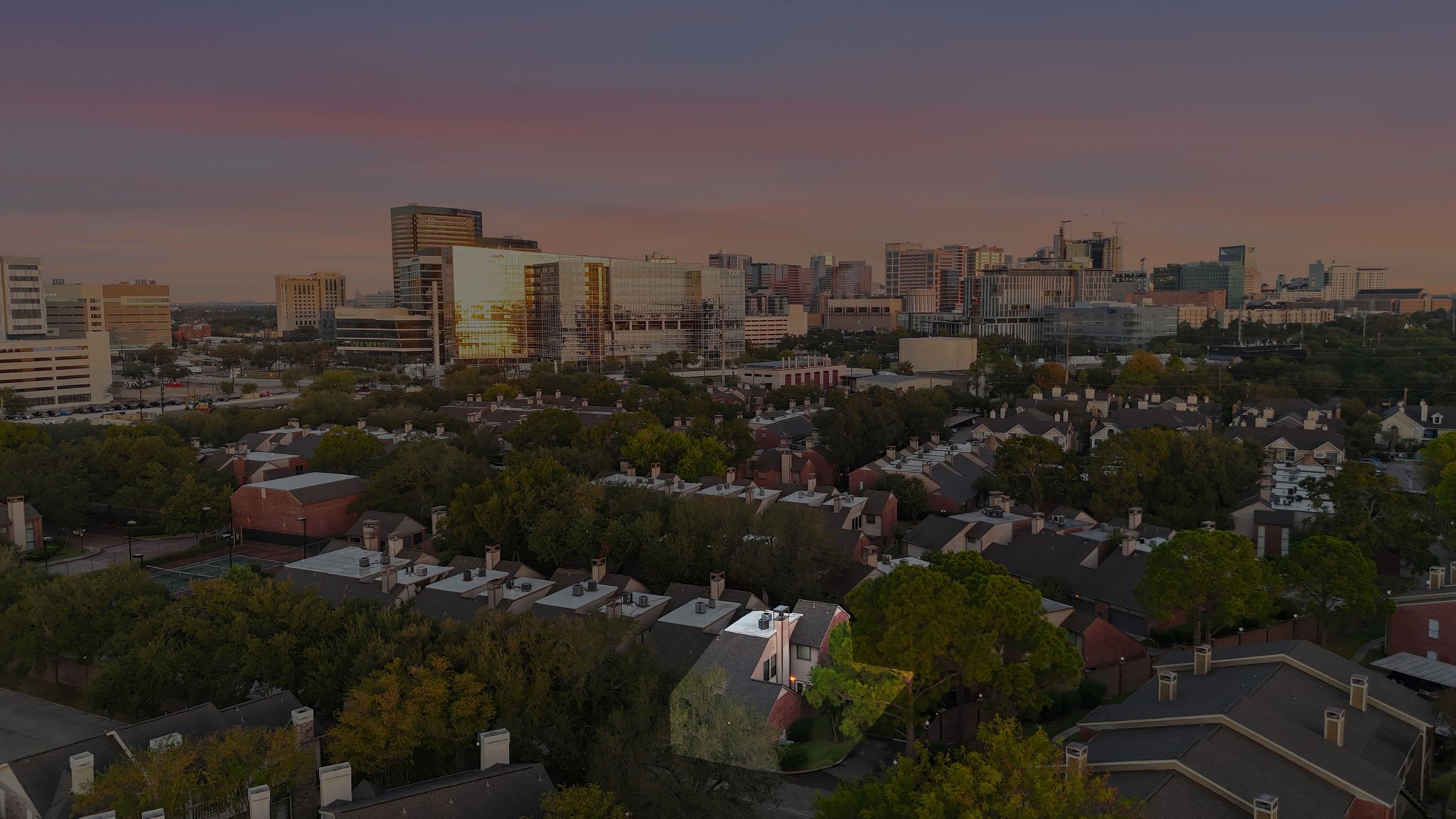 7447 Cambridge Street, Unit 65 Houston, TX 77054 - Photo 32 of 42 a view of a city with tall buildings