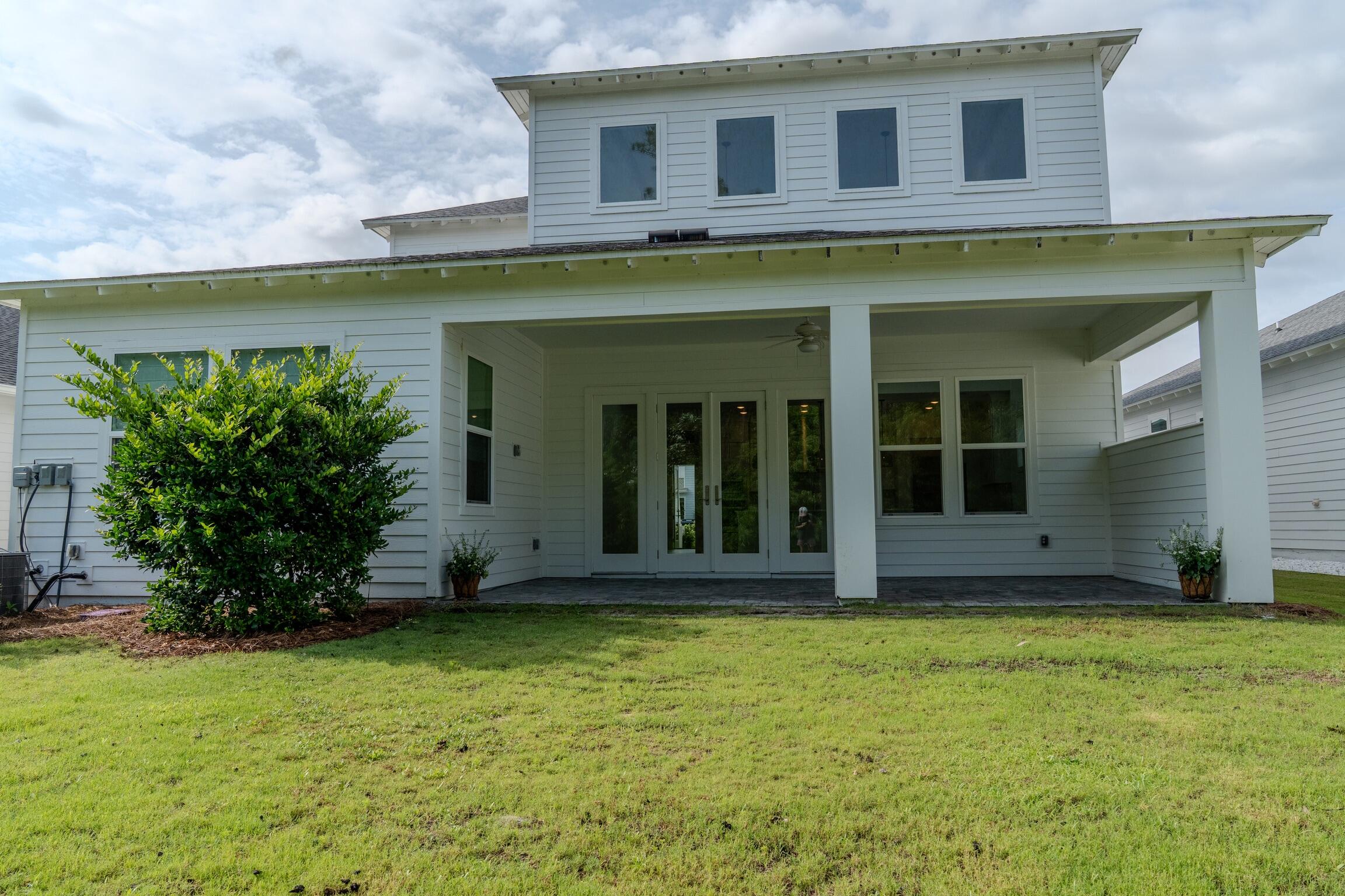 21 Anastasia Cir Inlet Beach Inlet Beach, FL 32461 - Photo 24 of 31 rear view of house with covered patio an