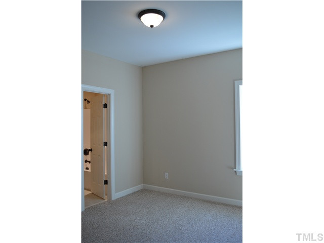 933 Palace Garden Way Raleigh, NC 27603 - Photo 19 of 25 There are three secondary bedrooms in addition to the master bedroom and downstairs guest suite. Bedroom