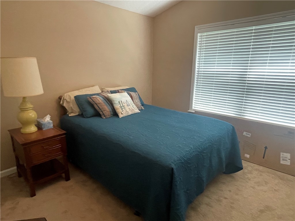 261 Promise Lane Brunswick, GA 31525 - Photo 4 of 8 Upstairs Bedroom with Walk In Closet