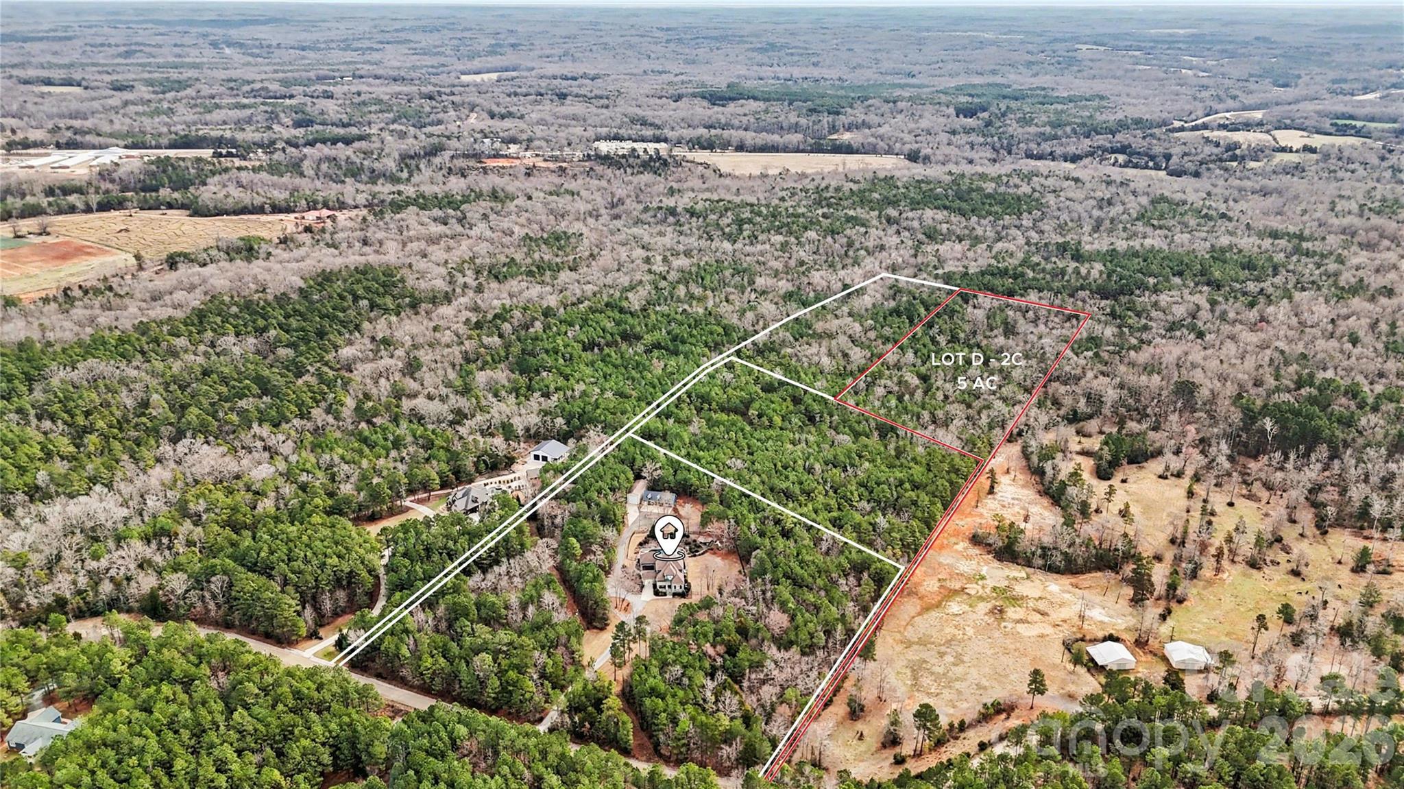 0 Three Crow Road, Unit D2C Lancaster, SC 29720 - Photo 12 of 13 an aerial view of residential houses with outdoor space