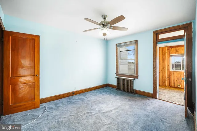 a view of an empty room with window