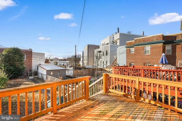 a view of a balcony with city view