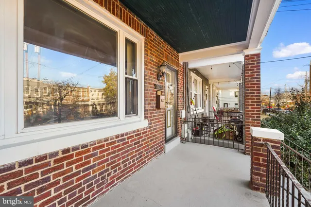 a balcony with furniture and city view