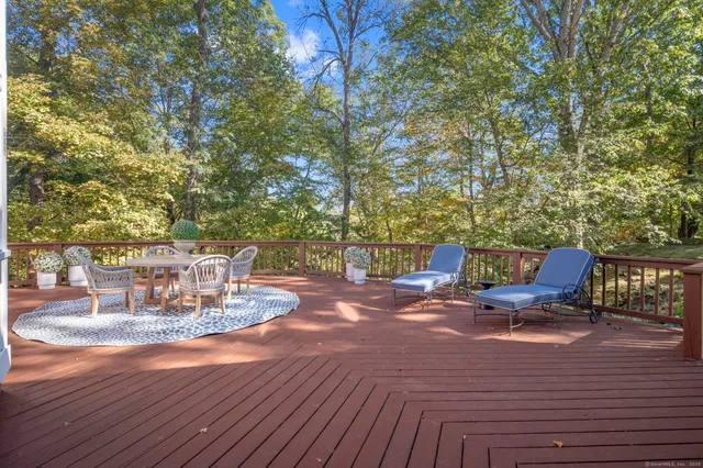 a view of a chairs and table on the wooden floor