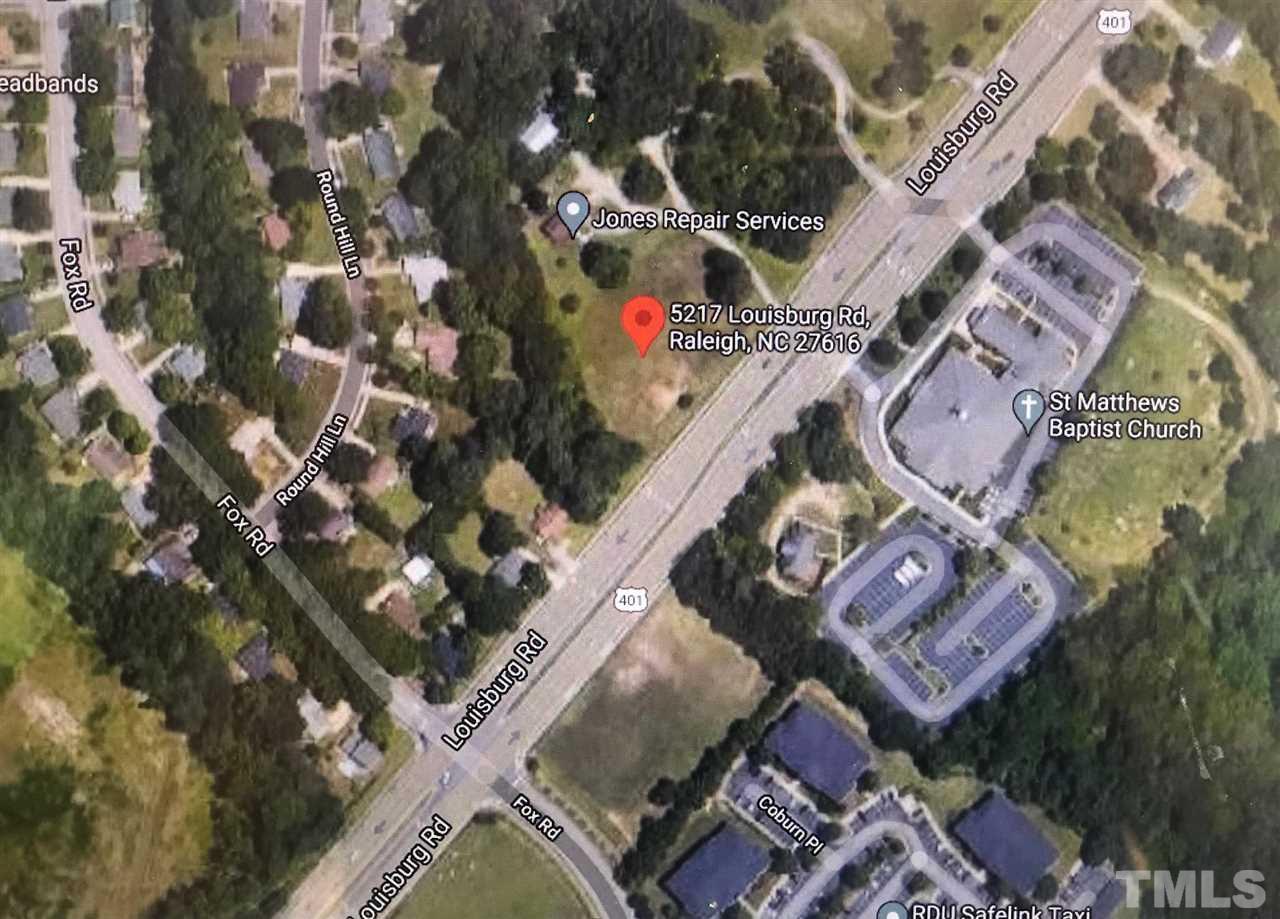 5217 Louisburg Road Raleigh, NC 27616 - Photo 3 of 7 an aerial view of a city