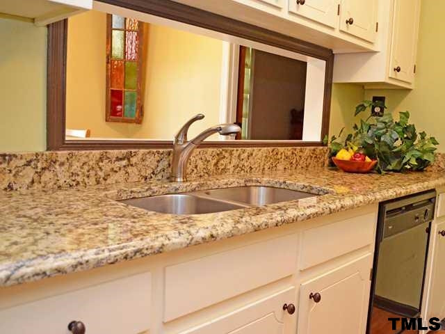 3625 Mill Run, Unit 5 Raleigh, NC 27612 - Photo 8 of 22 Stainless steel double sinks. Convenient pass through to dining room. Kitchen