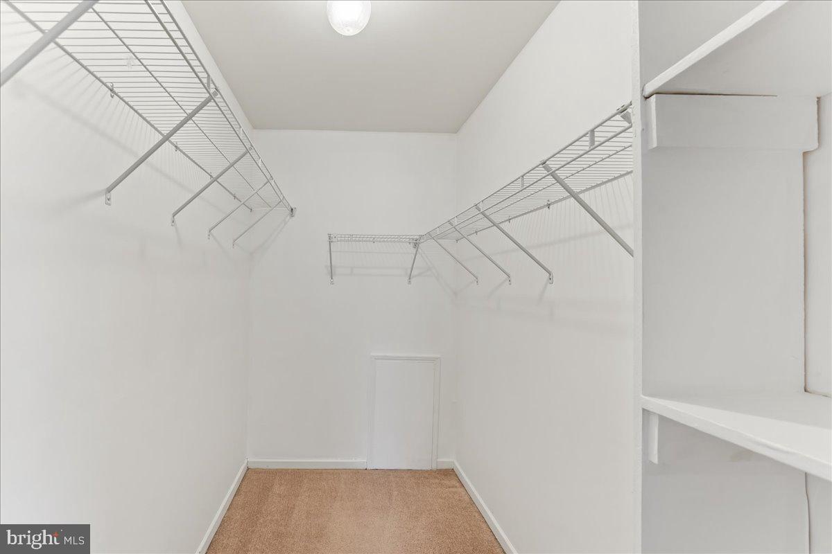 44 Witherspoon Court, Unit 137 Chesterbrook, PA 19087 - Photo 18 of 26 a view of a room with racks on the wall