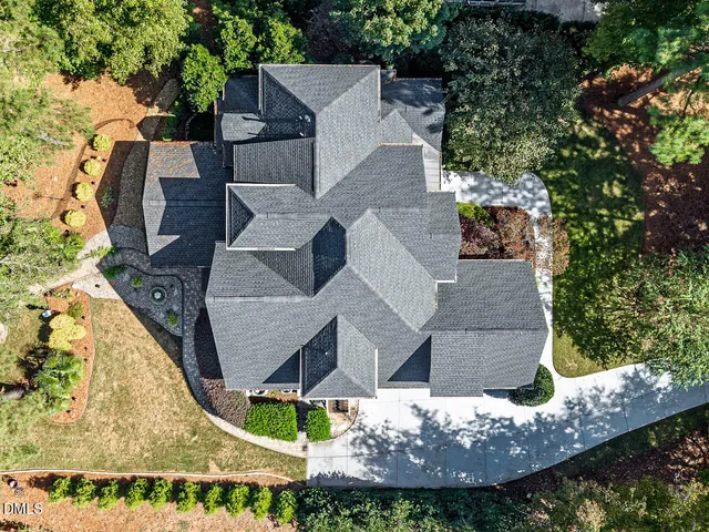an aerial view of residential house with outdoor space
