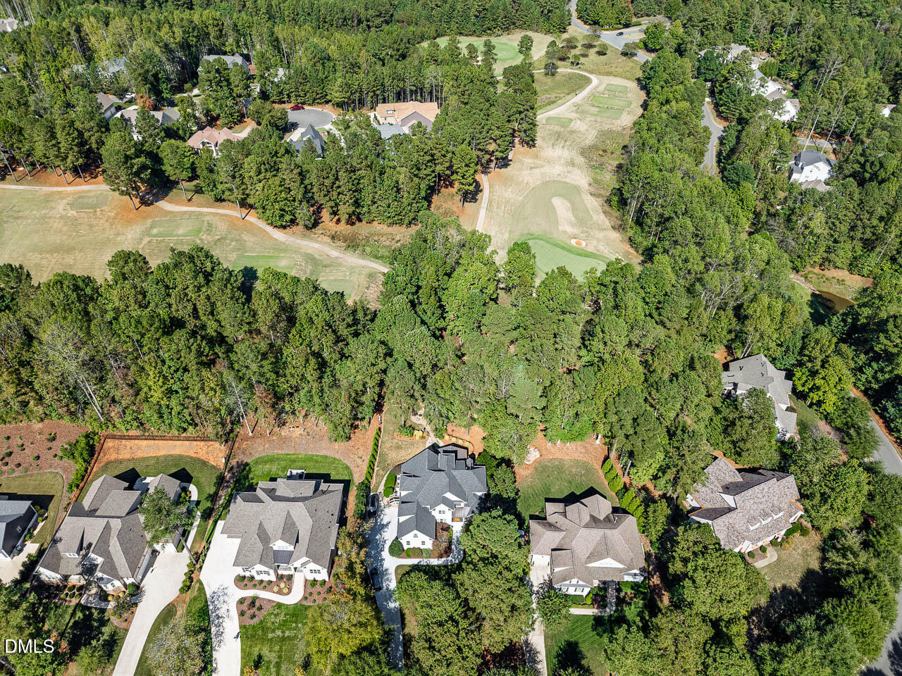 316 Chapel Ridge Drive Pittsboro, NC 27312 - Photo 21 of 69 an aerial view of a house with a yard and lake view