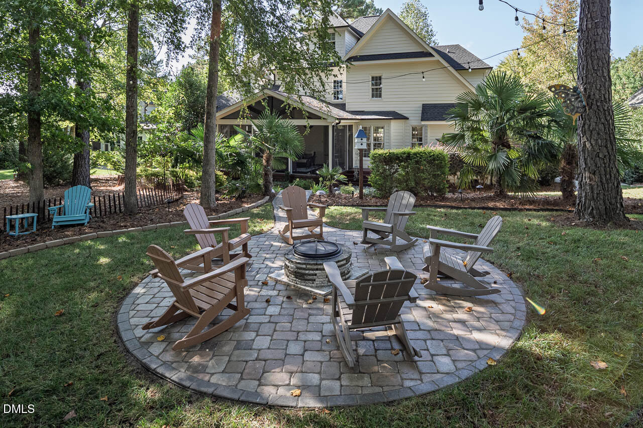 316 Chapel Ridge Drive Pittsboro, NC 27312 - Photo 26 of 69 a view of a house with backyard porch and sitting area