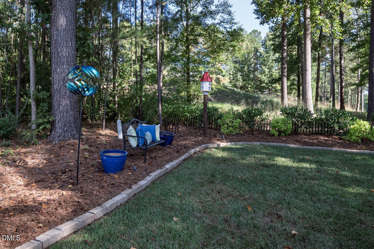 316 Chapel Ridge Drive Pittsboro, NC 27312 - Photo 27 of 69 a view of a backyard with sitting area