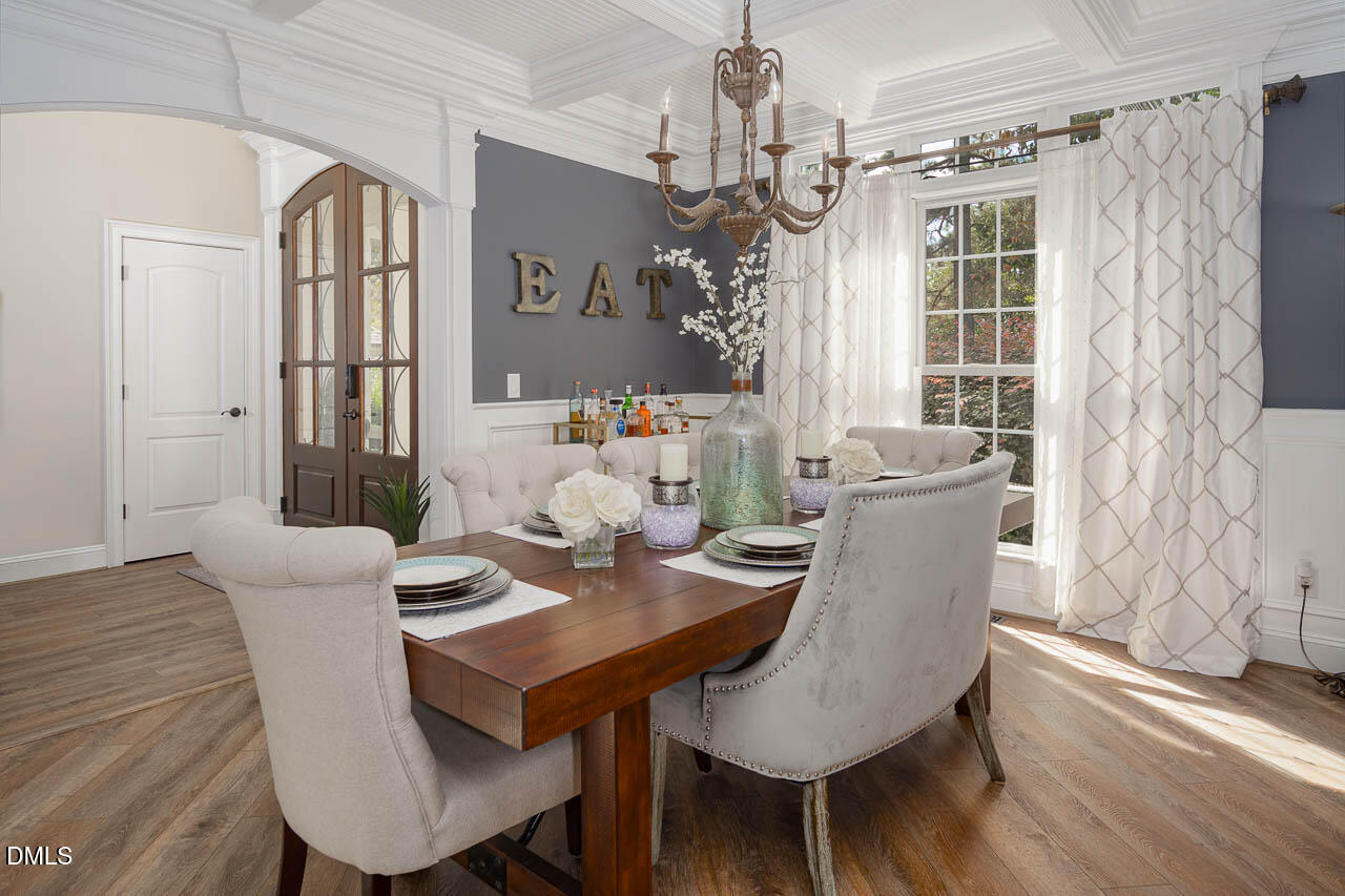 316 Chapel Ridge Drive Pittsboro, NC 27312 - Photo 47 of 69 a view of a dining room with furniture window and wooden floor