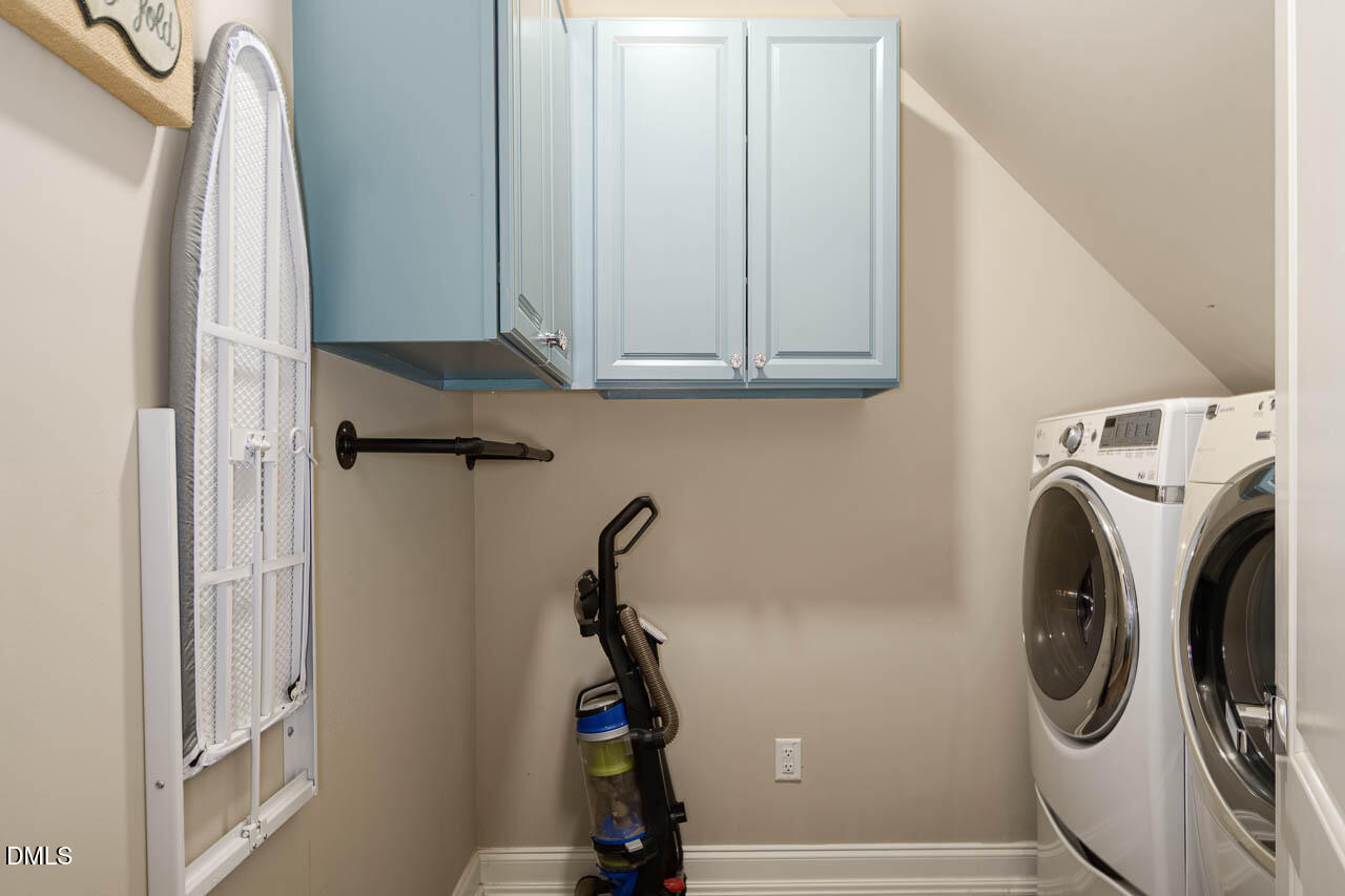 316 Chapel Ridge Drive Pittsboro, NC 27312 - Photo 49 of 69 a view of a storage & utility room with a washer dryer