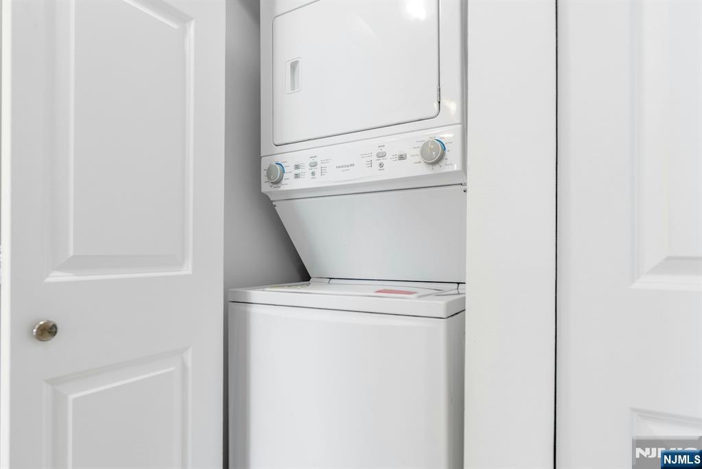 100 Old Palisade Road, Unit 1814 Fort Lee, NJ 07024 - Photo 12 of 23 a utility room with dryer and washer