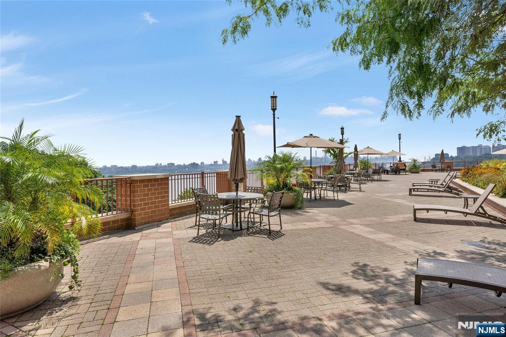 100 Old Palisade Road, Unit 1814 Fort Lee, NJ 07024 - Photo 20 of 23 a view of a terrace with seating space