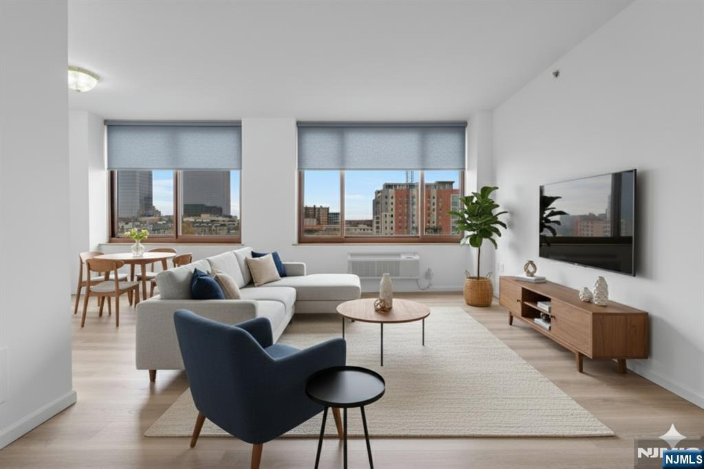 100 Old Palisade Road, Unit 1814 Fort Lee, NJ 07024 - Photo 2 of 23 a living room with furniture and a flat screen tv