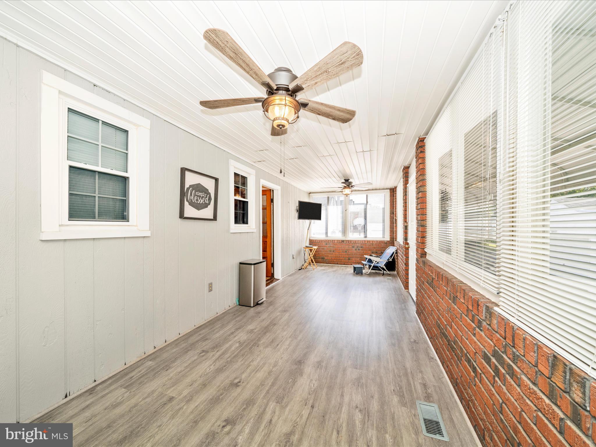 3707 North Point Road Dundalk, MD 21222 - Photo 23 of 56 a view of a house with wooden floor and windows
