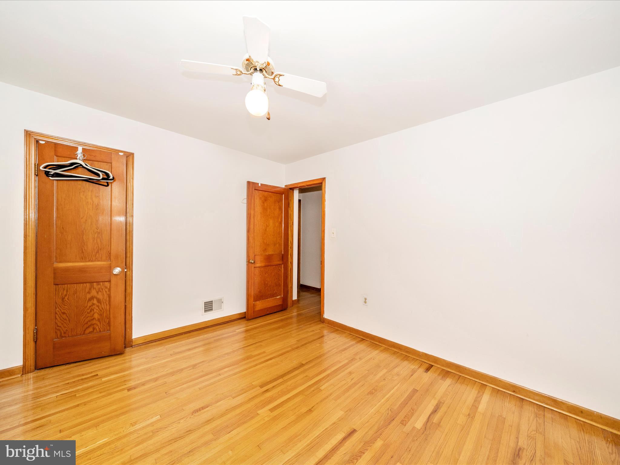 3707 North Point Road Dundalk, MD 21222 - Photo 27 of 56 a view of an empty room with wooden floor