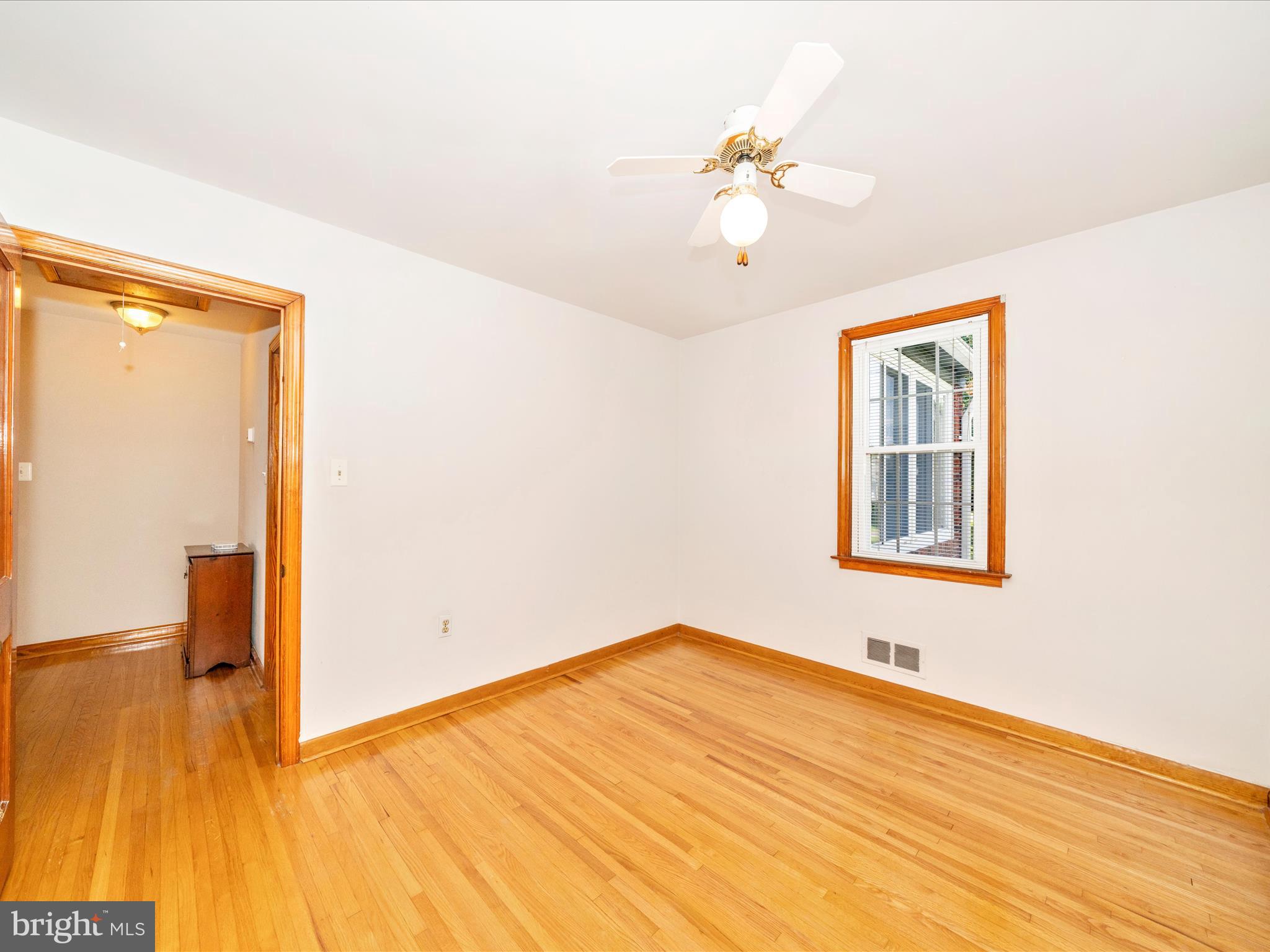 3707 North Point Road Dundalk, MD 21222 - Photo 28 of 56 a view of empty room with wooden floor