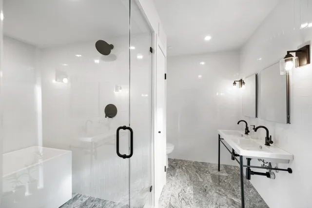 a very nice looking room with a shower