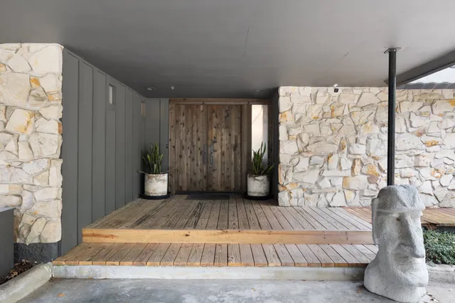 a view of entryway with wooden floor