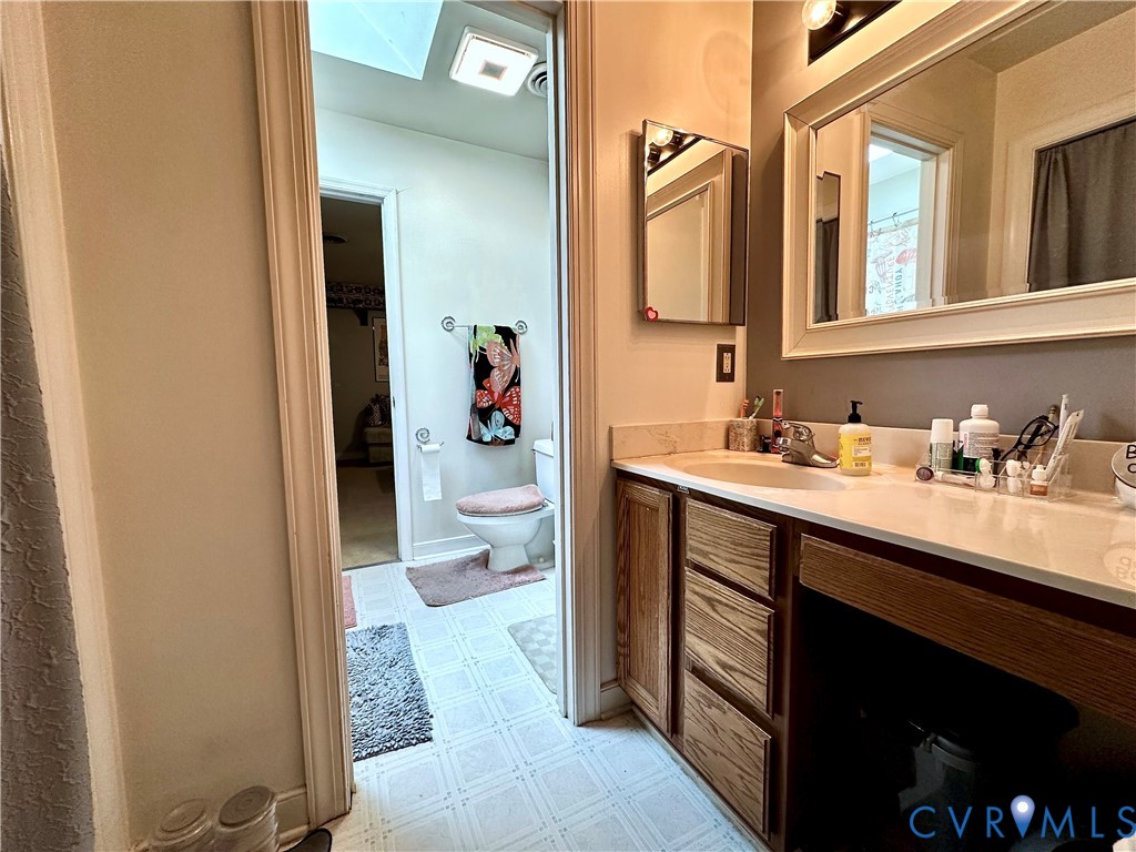 7817 Woodbrook Road Quinton, VA 23141 - Photo 12 of 28 Bathroom vanity with a single basin sink, light-to