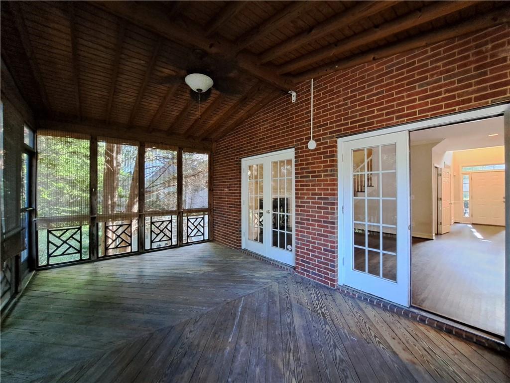 2242 Lenox Walk Northeast Atlanta, GA 30319 - Photo 24 of 80 a view of an empty room with wooden floor and next to a window
