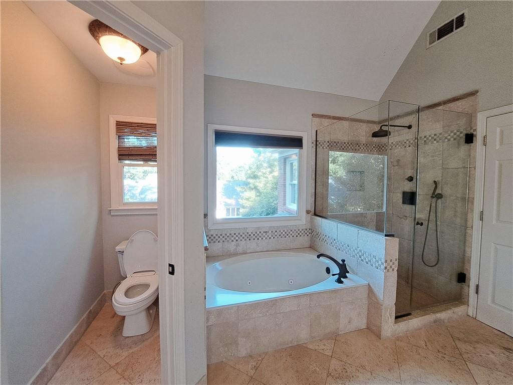 2242 Lenox Walk Northeast Atlanta, GA 30319 - Photo 45 of 80 a bathroom with a granite countertop tub toilet and a bathtub