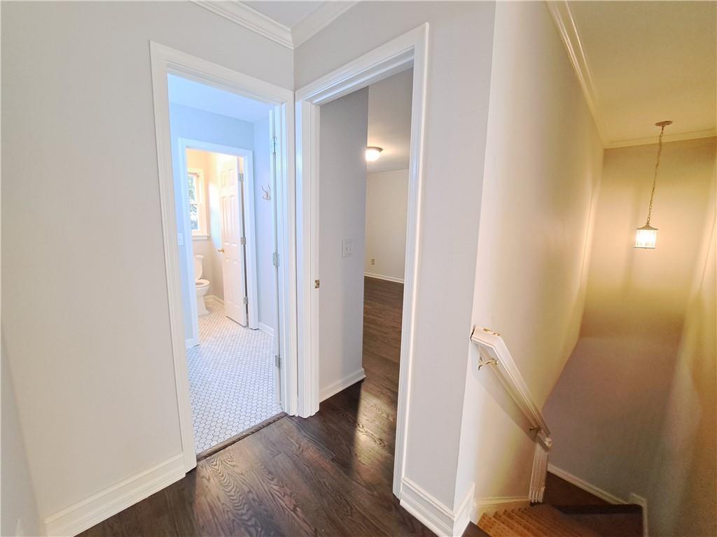 2242 Lenox Walk Northeast Atlanta, GA 30319 - Photo 49 of 80 a view of a hallway with wooden floor