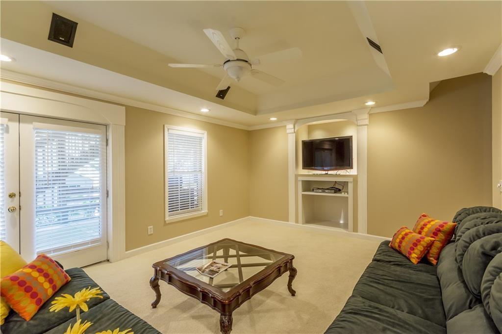 2242 Lenox Walk Northeast Atlanta, GA 30319 - Photo 59 of 80 a bedroom with a bed and a couch