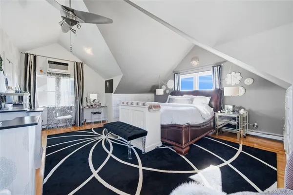 a very nice looking room with dining room furniture