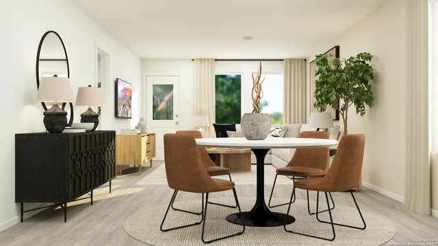 a view of a dining room with furniture window and outside view