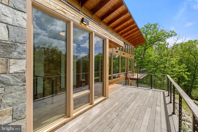 a large kitchen with a large window