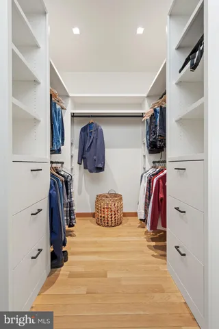 a balcony with furniture and wooden floor