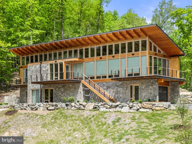 a view of a balcony with wooden floor
