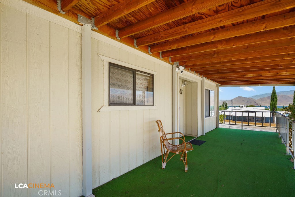 6004 Maple Avenue Mountain Mesa, CA 93240 - Photo 4 of 26 a view of a porch with a backyard
