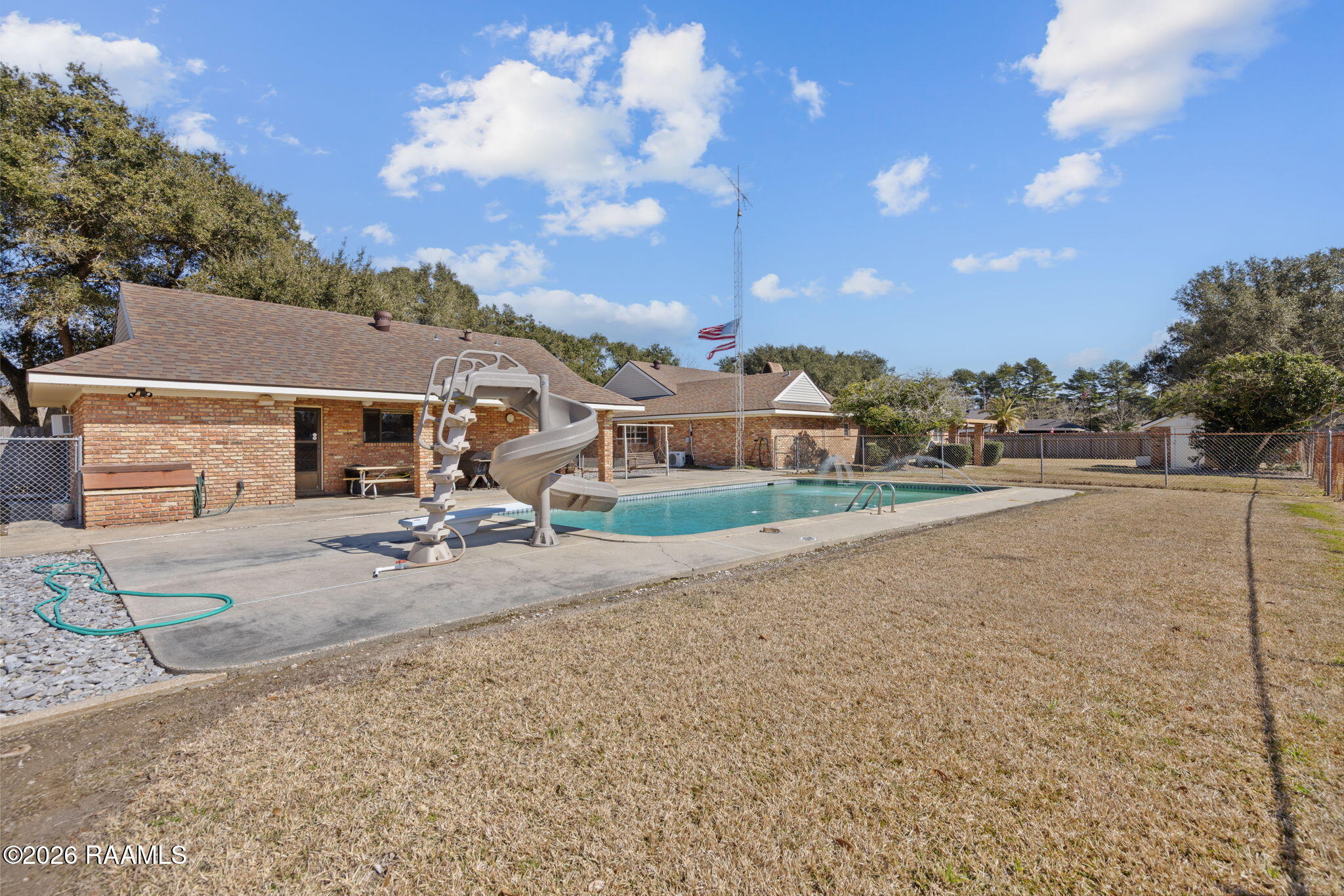350 Teljean Road Lafayette, LA 70503 - Photo 32 of 37 Pool and pool house