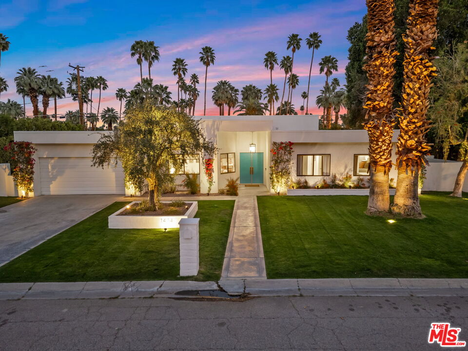 1414 Sagebrush Road Palm Springs, CA 92264 - Photo 3 of 48 a front view of a house with a yard