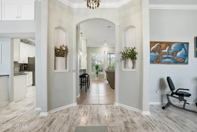 a view of a dining room with furniture and window