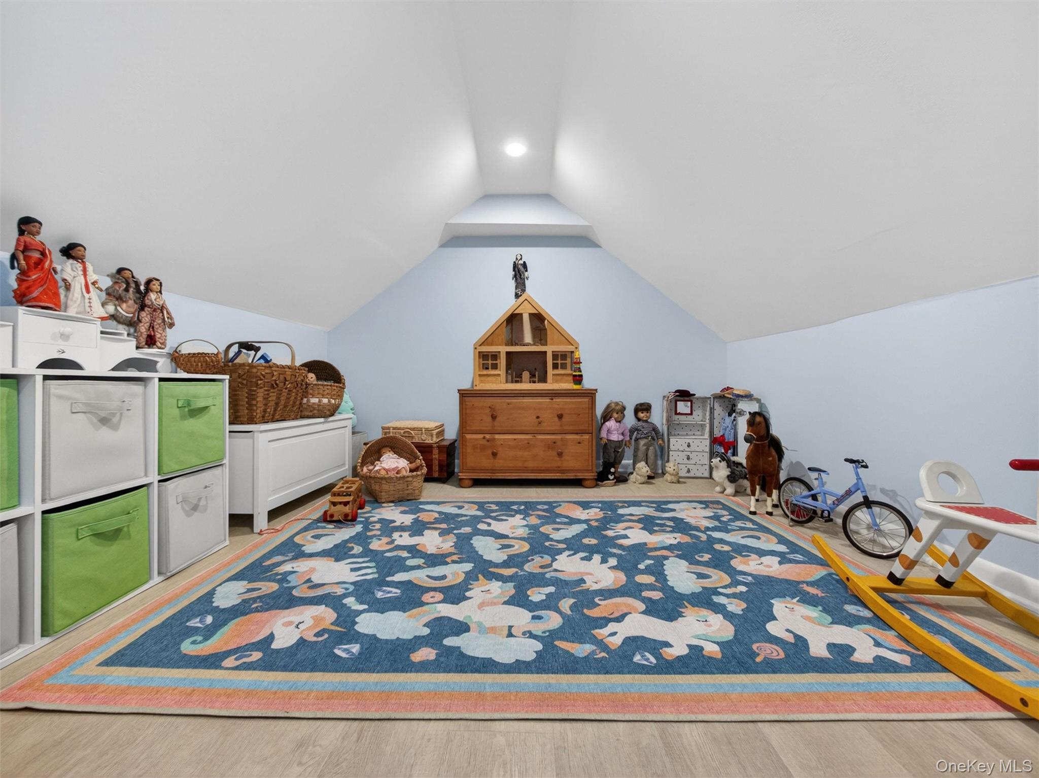 98 Greenbush Road Tappan, NY 10983 - Photo 19 of 33 Versatile bonus room with light wood-finish flooring, light blue walls, and a recessed ceiling light