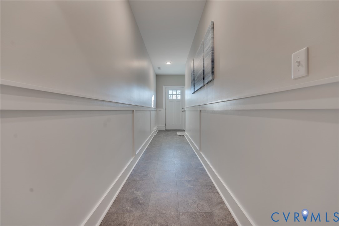 15305 Princess Lauren Lane Midlothian, VA 23112 - Photo 22 of 36 a view of a hallway with staircase