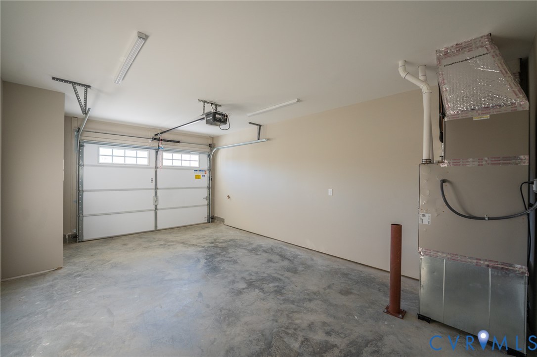 15305 Princess Lauren Lane Midlothian, VA 23112 - Photo 27 of 36 a view of a room with rack on the wall