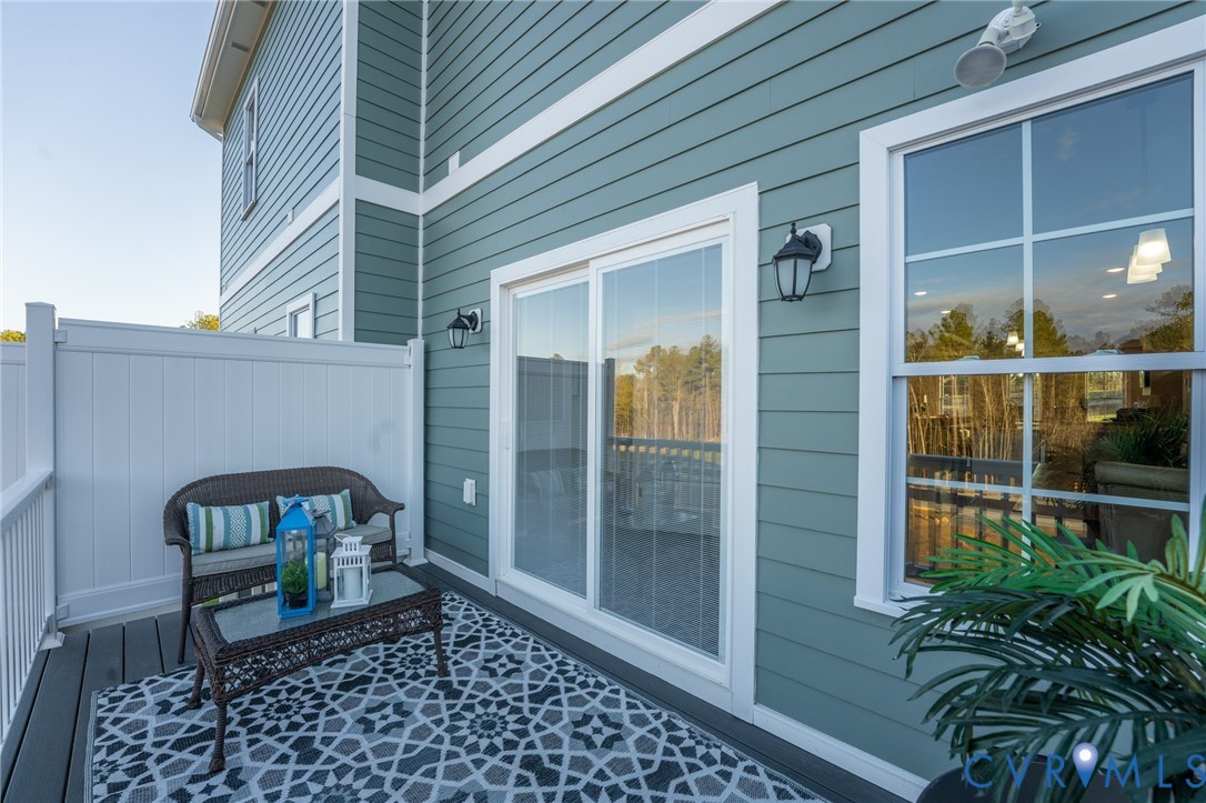 15305 Princess Lauren Lane Midlothian, VA 23112 - Photo 5 of 36 a front view of a house with garden