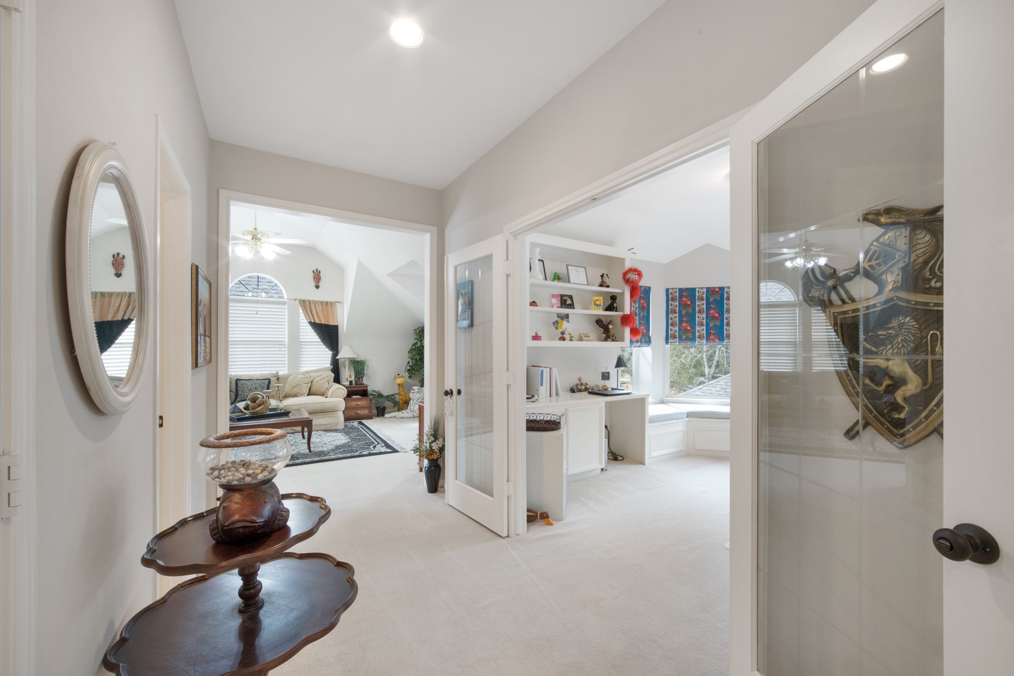 9510 Ashdown Forest Drive Spring, TX 77379 - Photo 29 of 50 UPSTAIRS FLEX SPACE – bright upstairs area leading to additional rooms, ideal for a study nook, reading area, or additional workspace. The open design keeps the upper level light and inviting.